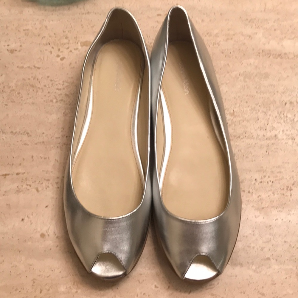 Calvin Klein silver peep toe flats. Like new.